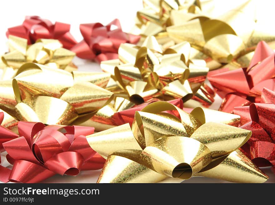 Gold gift ribbon on a white background