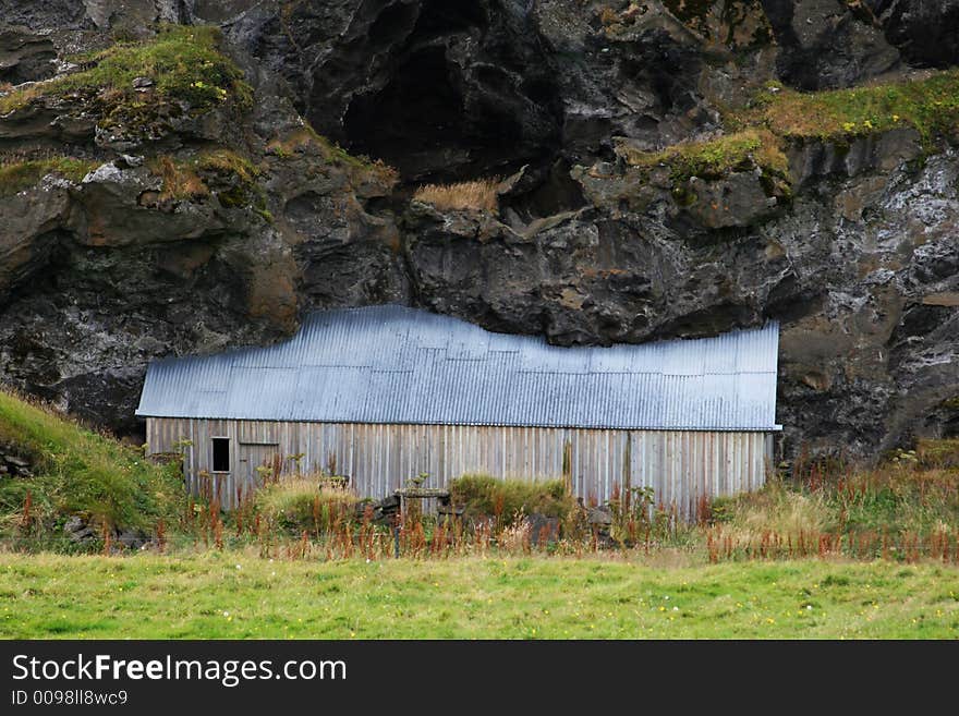 House under the cliff