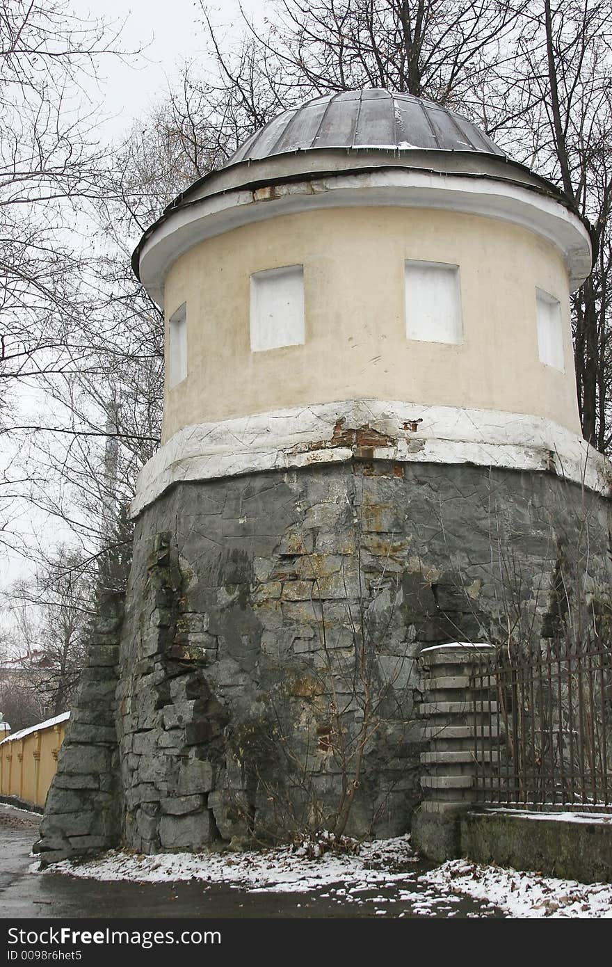 Old tower (XIX century) at the entry of a city square