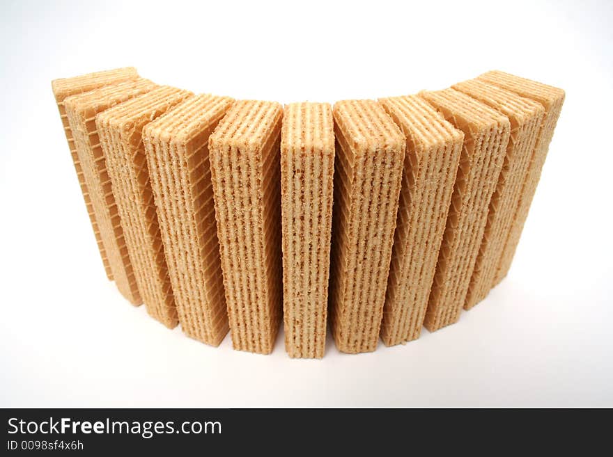 Wafers with a vanilla cream standing a semicircle the top view wide screen. Wafers with a vanilla cream standing a semicircle the top view wide screen