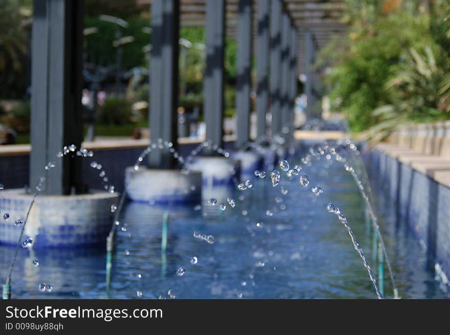 Pretty fountain in Marbella, Stop motion, droplets in mid-air. Pretty fountain in Marbella, Stop motion, droplets in mid-air.