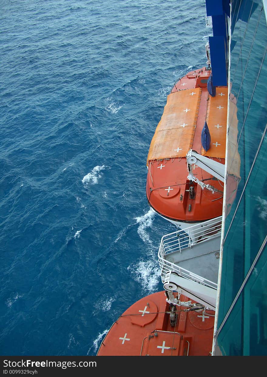 Cruise Ship Lifeboats over the Caribbean. Cruise Ship Lifeboats over the Caribbean