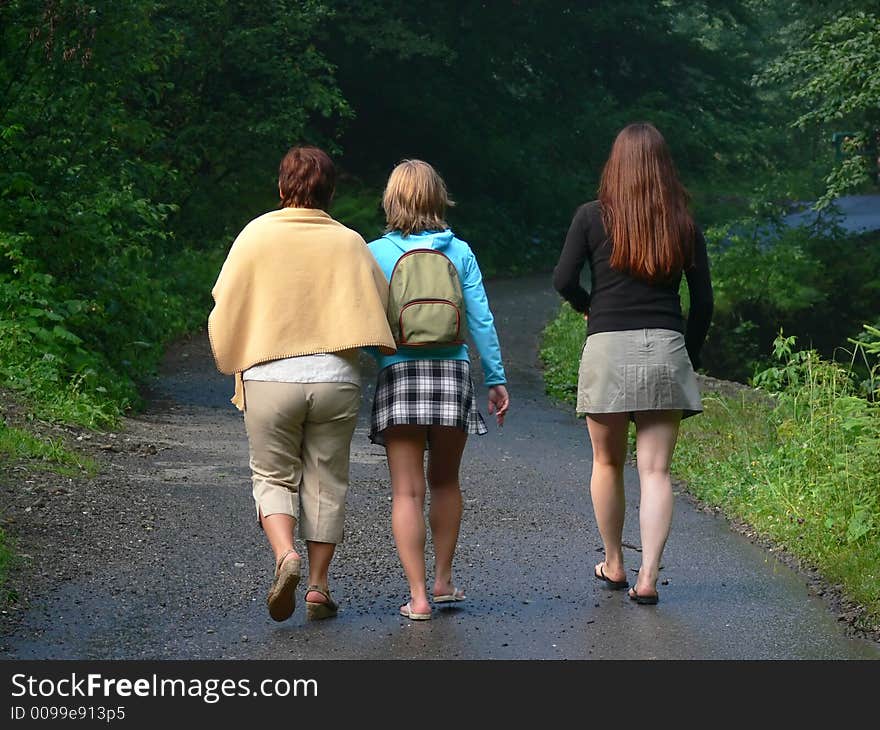 Mother and two daughters trekking in the mountains