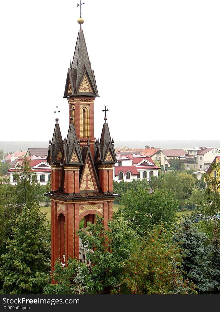 Red tower of a christian chapel. Red tower of a christian chapel.