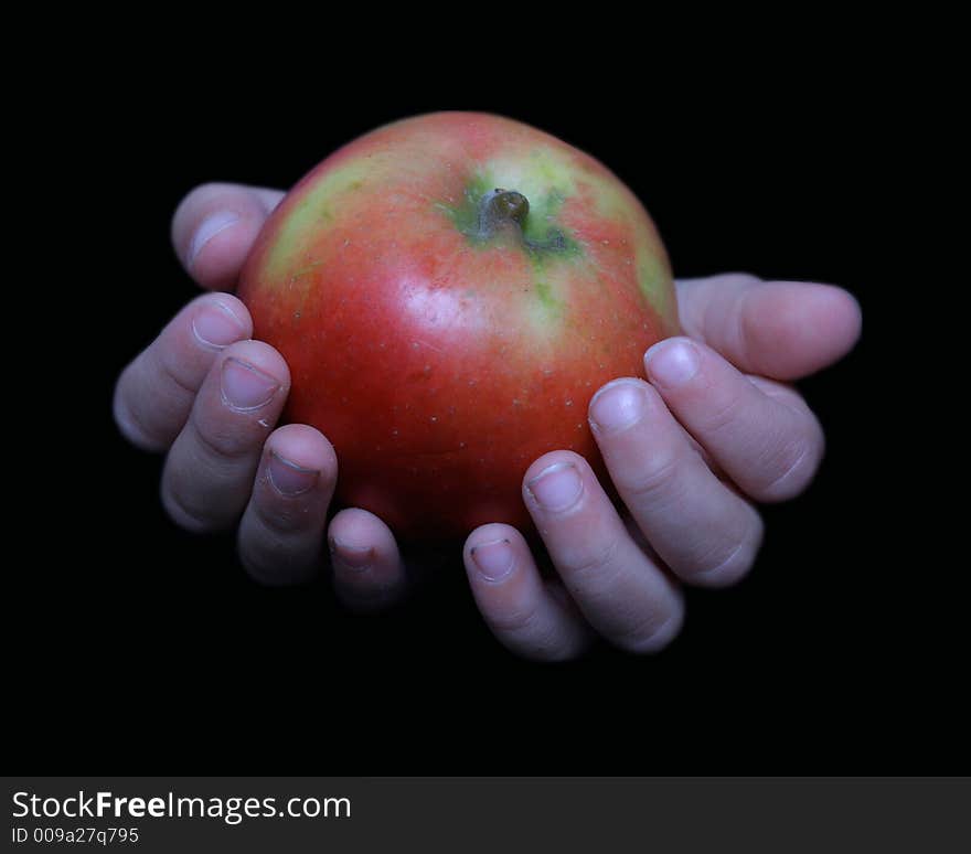 Little child holding an apple. Little child holding an apple