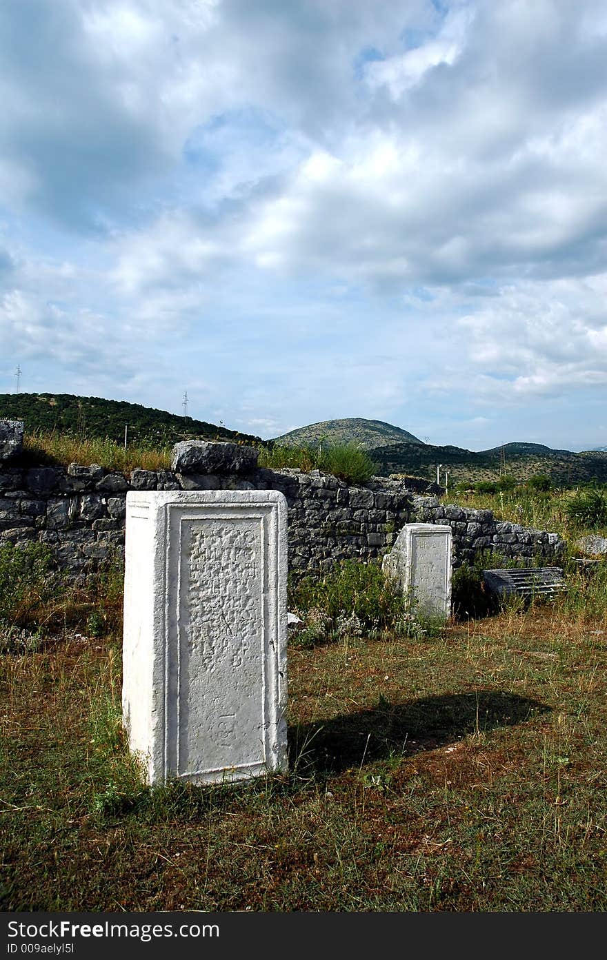 Roman epitaph in old town Docle near the city Podgorica in state Montenegro. Roman epitaph in old town Docle near the city Podgorica in state Montenegro.