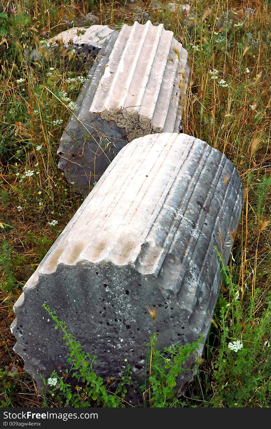 Remains of old roman abutment with fret and epitaph. Remains of old roman abutment with fret and epitaph.