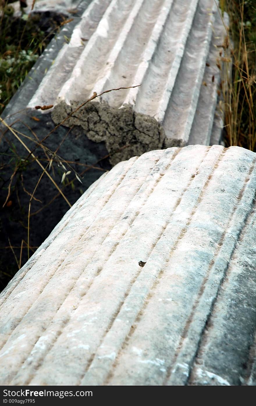 Remains of old roman abutment with fret and epitaph. Remains of old roman abutment with fret and epitaph.