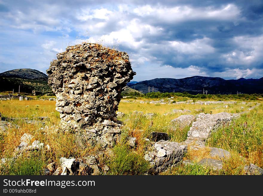 Remains of old roman abutment with fret and epitaph. Remains of old roman abutment with fret and epitaph.