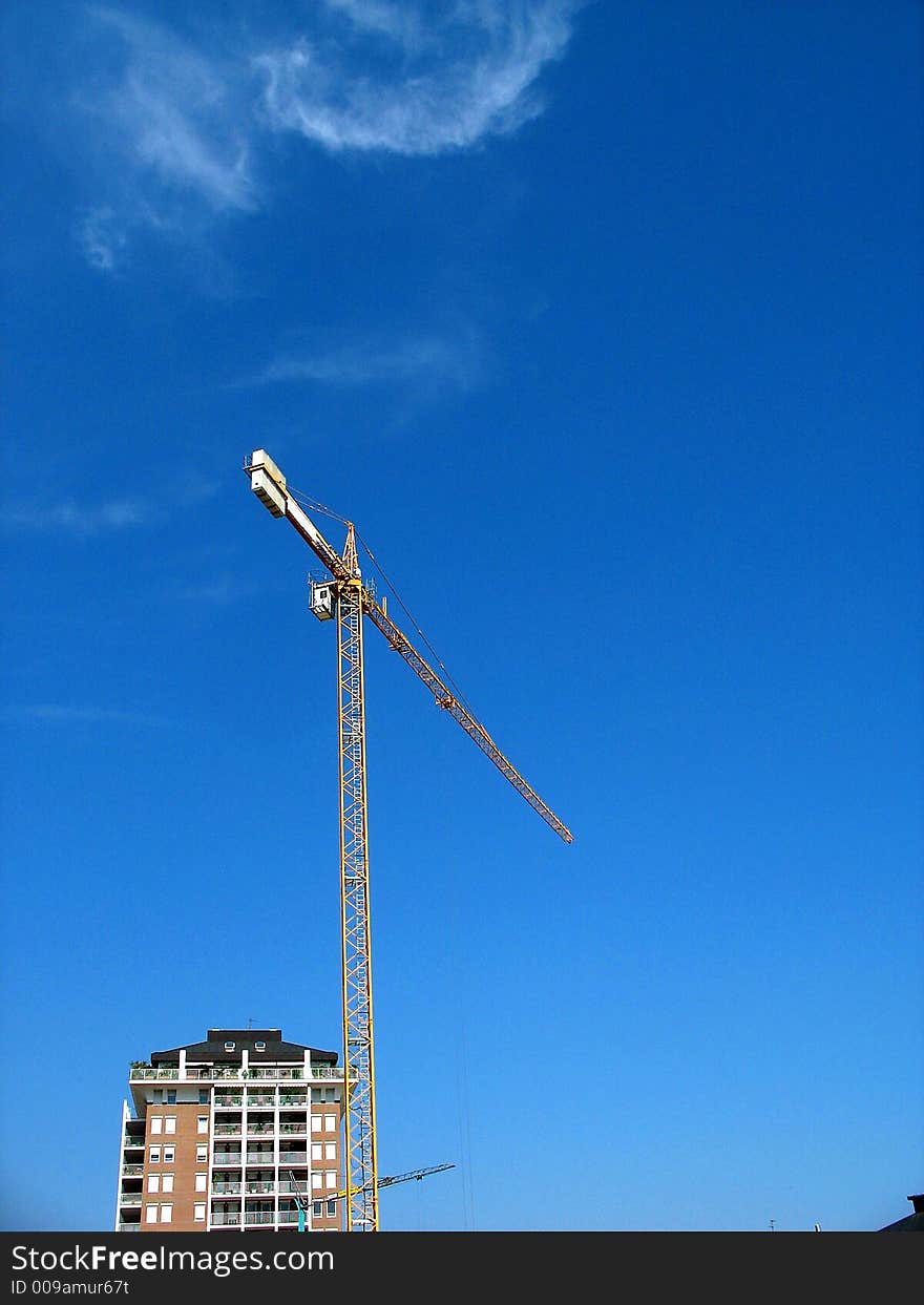 Crane working in a building yard