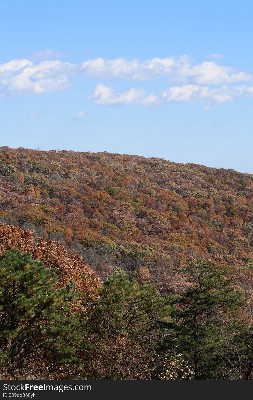 Mountain and sky view during fall. Mountain and sky view during fall