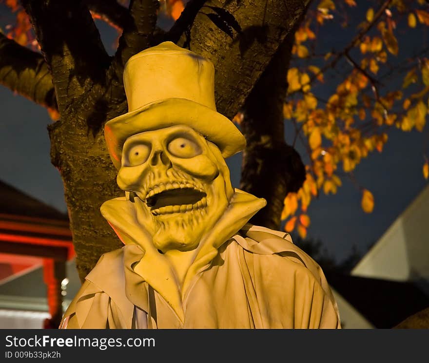 Halloween ghost on a neighbor's lawn on Halloween night. Halloween ghost on a neighbor's lawn on Halloween night.