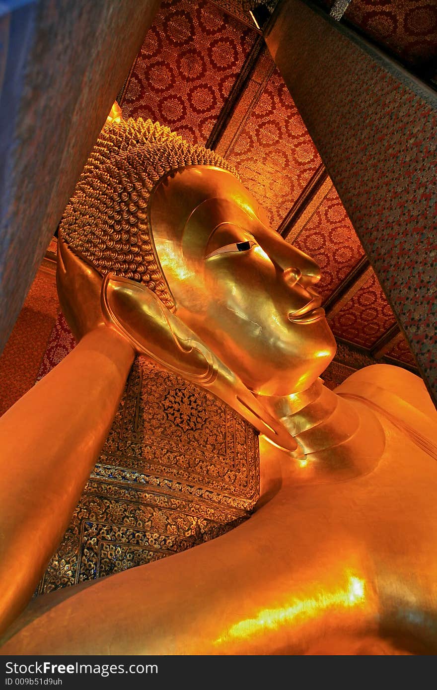 The fragment of laying Buddha in wat Pho in Bangkok, Thailand