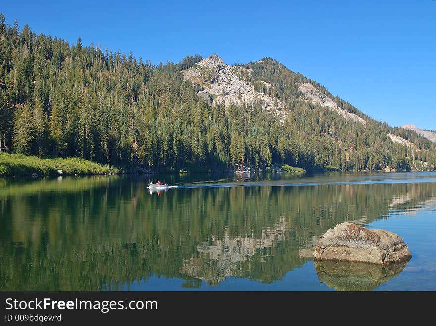 Motorboat on a lake in the high Sierra of California