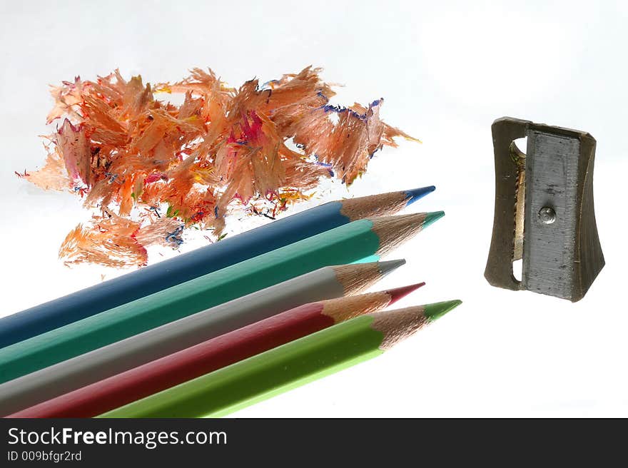 Pencils with pencil sharpener and debree. Pencils with pencil sharpener and debree