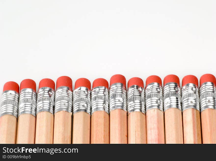 Close up shot of a row of pencils