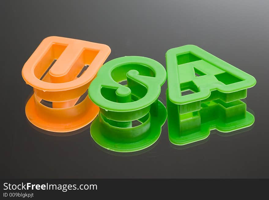 USA spelt out with plastic cookie cutters