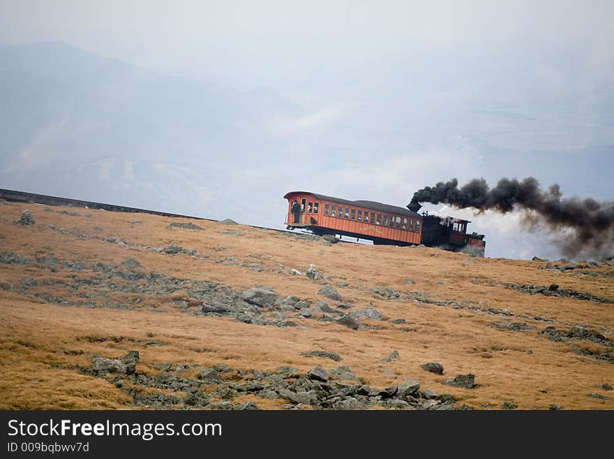 Tourist Train On Mt Washington In A Fall Cloudy Day