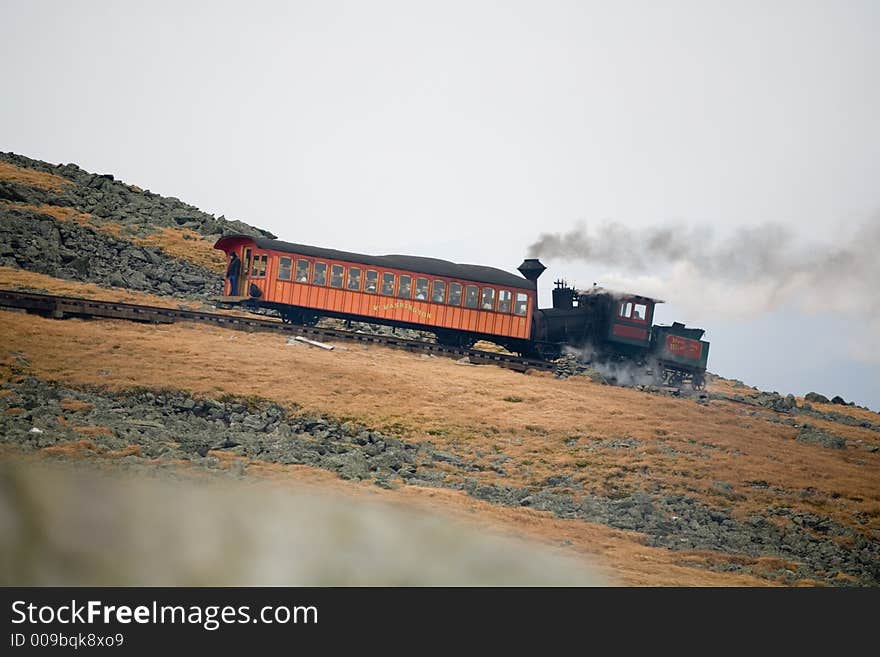 Tourist Train On Mt Washington In A Fall Cloudy Day