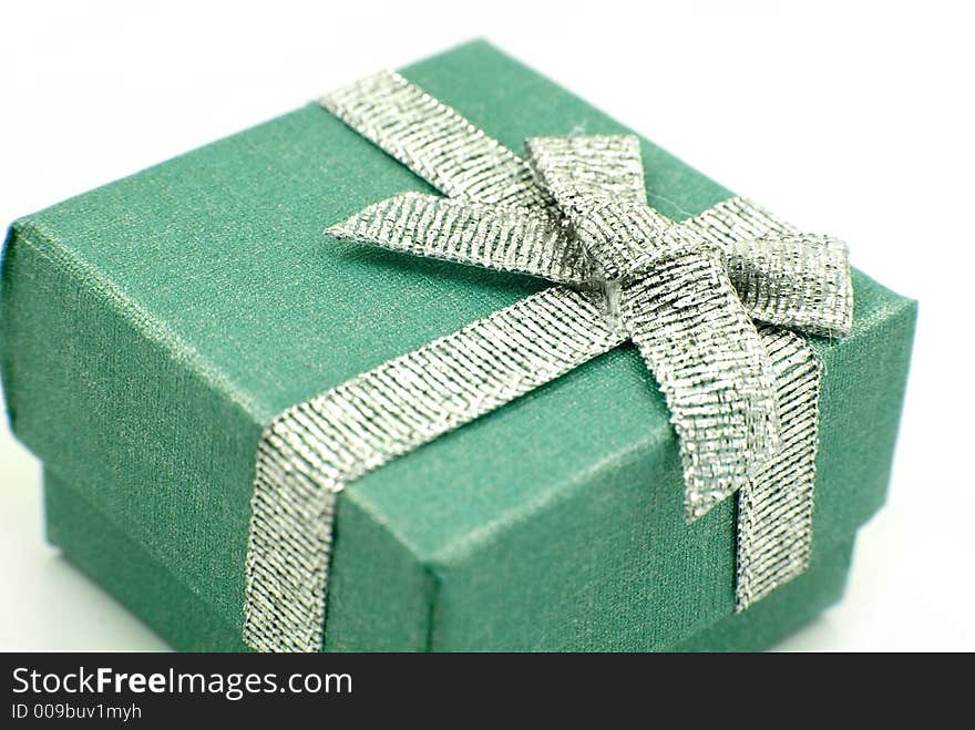 Green Gift Box with shiny silver ribbon