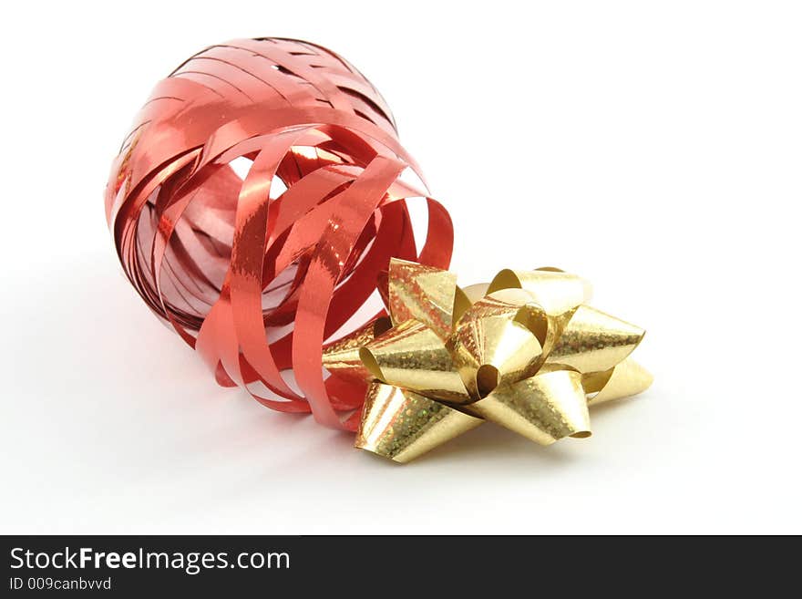 Gold gift ribbon on a white background