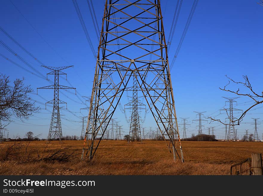 Electricity Pylons against an azure sky