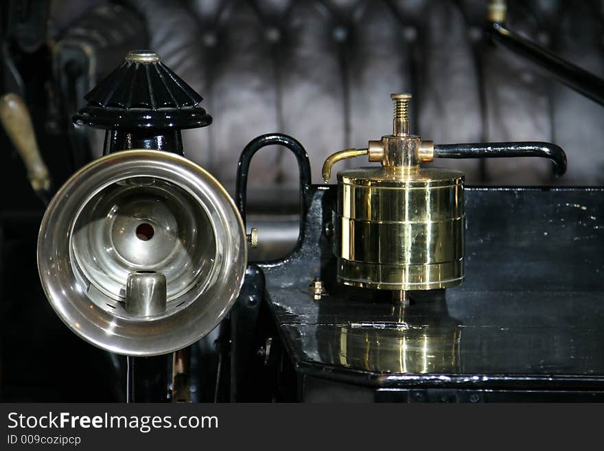 Vintage oil lamp on a car head lights