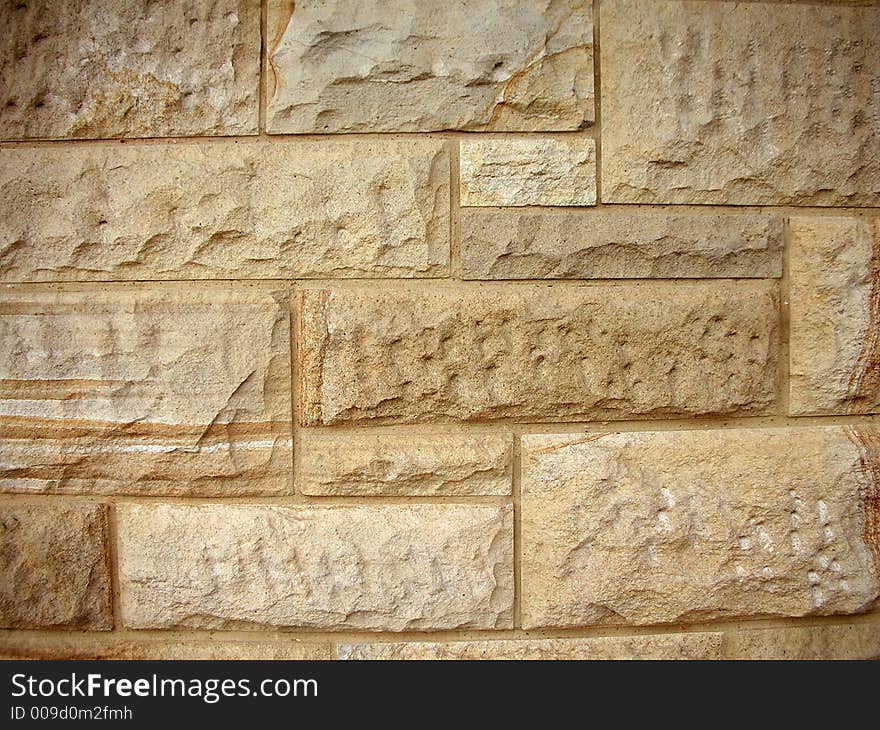 Wall background made from sandy colored bricks. Wall background made from sandy colored bricks