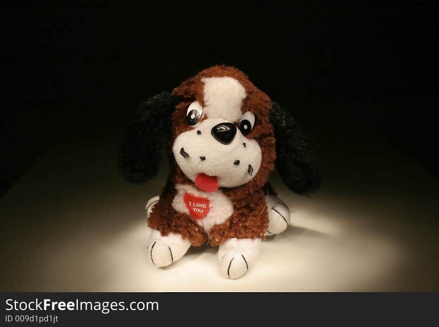 Toy dog with red heart