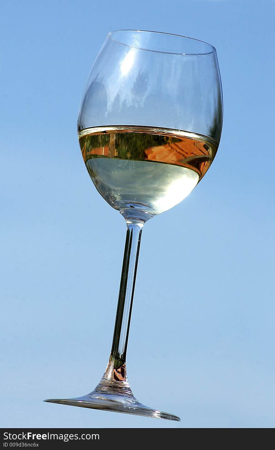 Glass of wine with sky background. Glass of wine with sky background