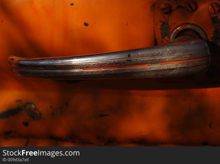 Vintage Rusted truck door handle in the desert