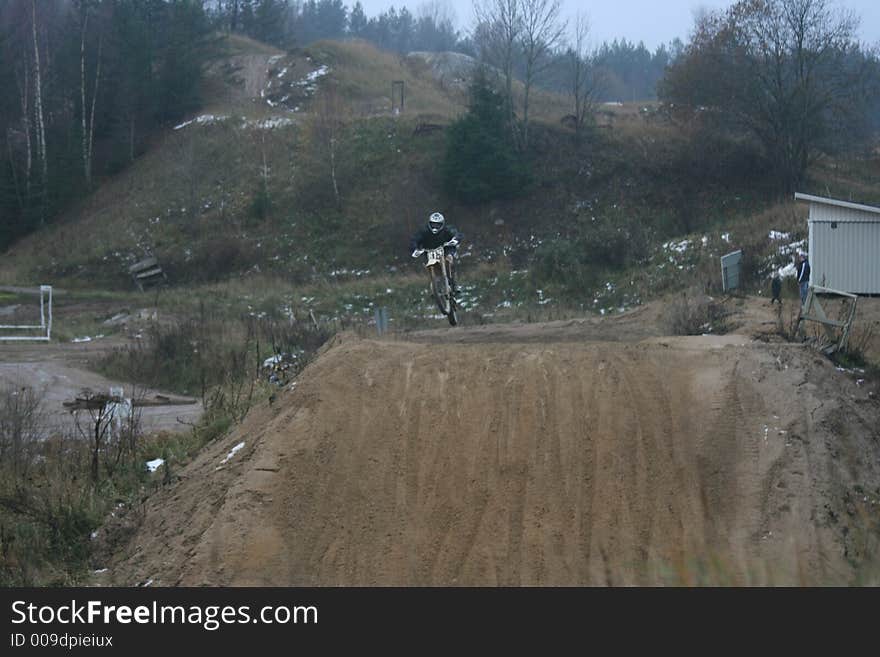 Jumping men in the motocross