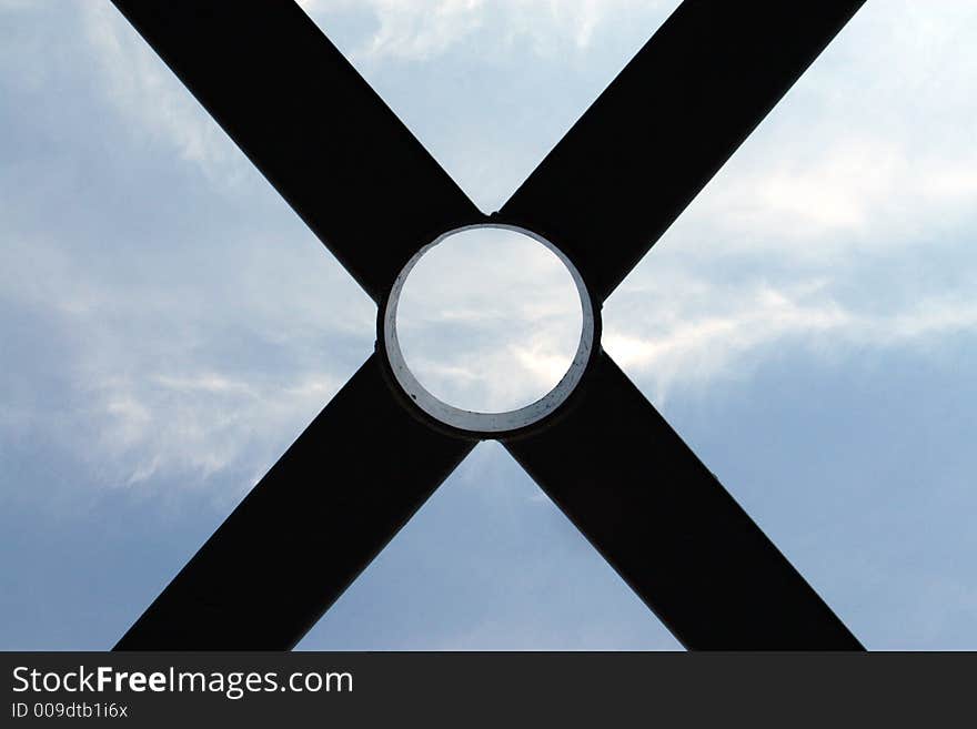 Structure beams on a bridge with sky in the background. Structure beams on a bridge with sky in the background