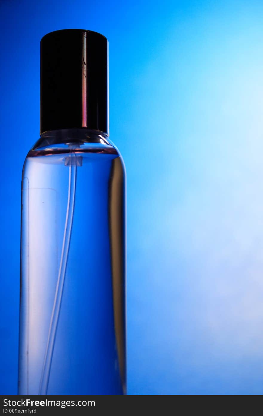 Long glass perfume with blue light