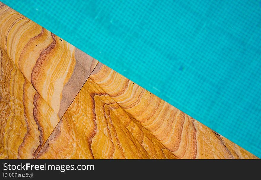 Water and the border of a swimming pool. Water and the border of a swimming pool