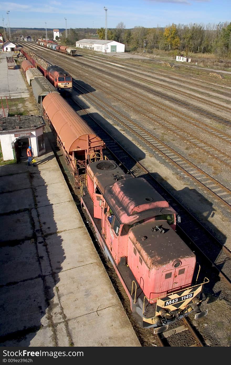 Freight trains in Bataszek, Hungary, transporting cereal and wood.