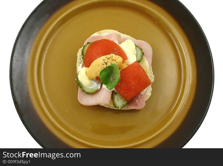 Colourful sandwich with mayonnaise on the plate