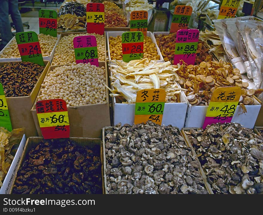 Typical goods such as dried fish and mushrooms in a Hongkong market outlet. Typical goods such as dried fish and mushrooms in a Hongkong market outlet