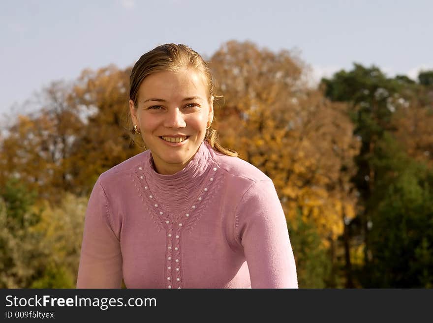 Beautiful women smiling in autumn sun. Beautiful women smiling in autumn sun