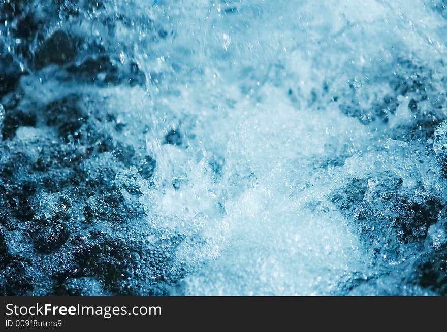 A blue splashing water background