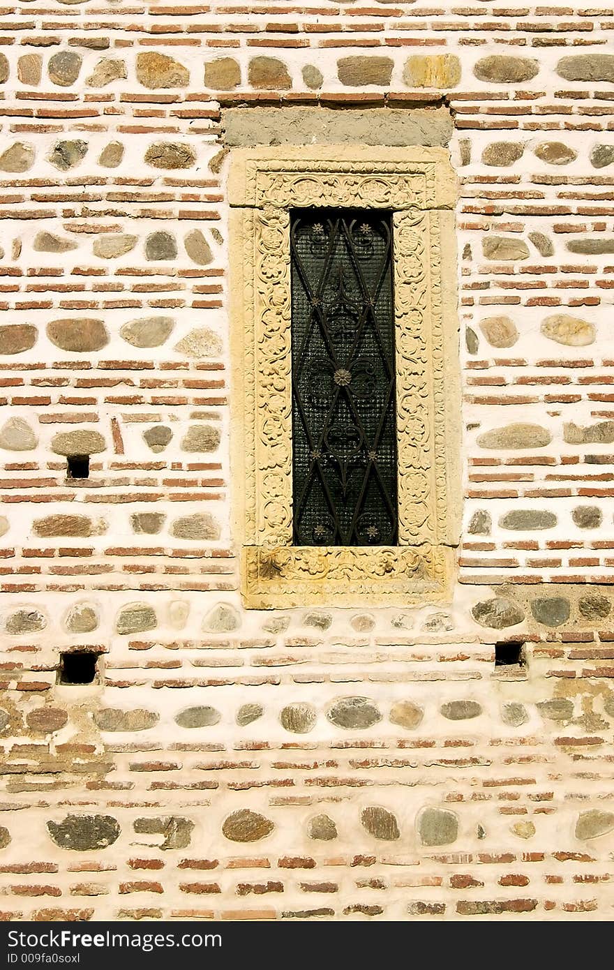 OLd brick wall with window