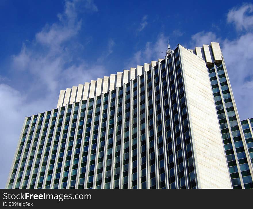 Frontal of modern business building at the sun. Frontal of modern business building at the sun