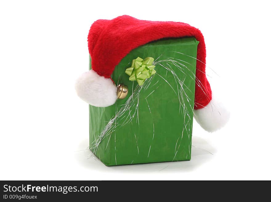 Green christmas present box and santa claus hat. Green christmas present box and santa claus hat