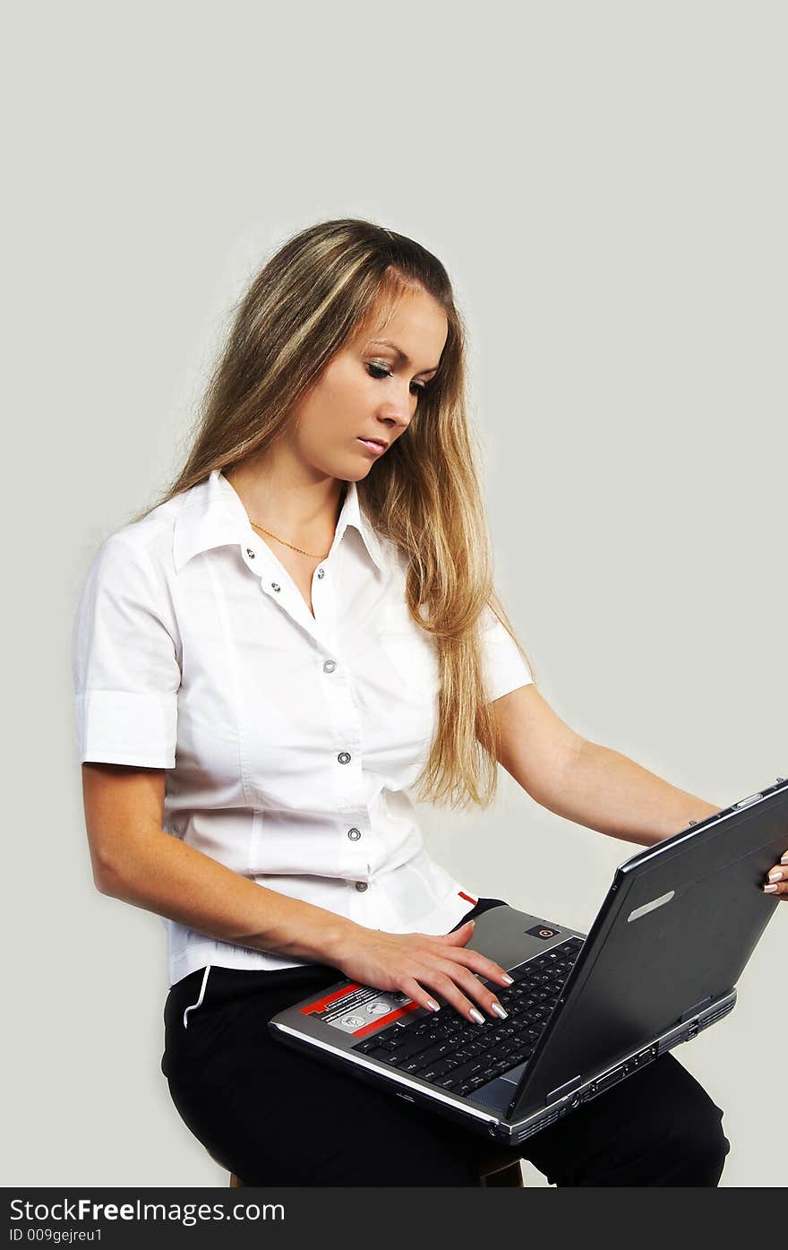 The girl working with a computer