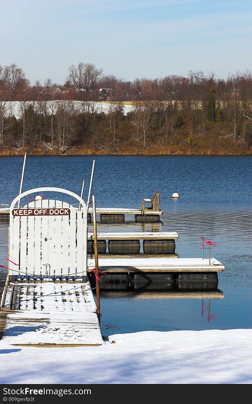 Landscape image with lake and Closed winter dock. Seneca Creek State Park, Maryland, USA