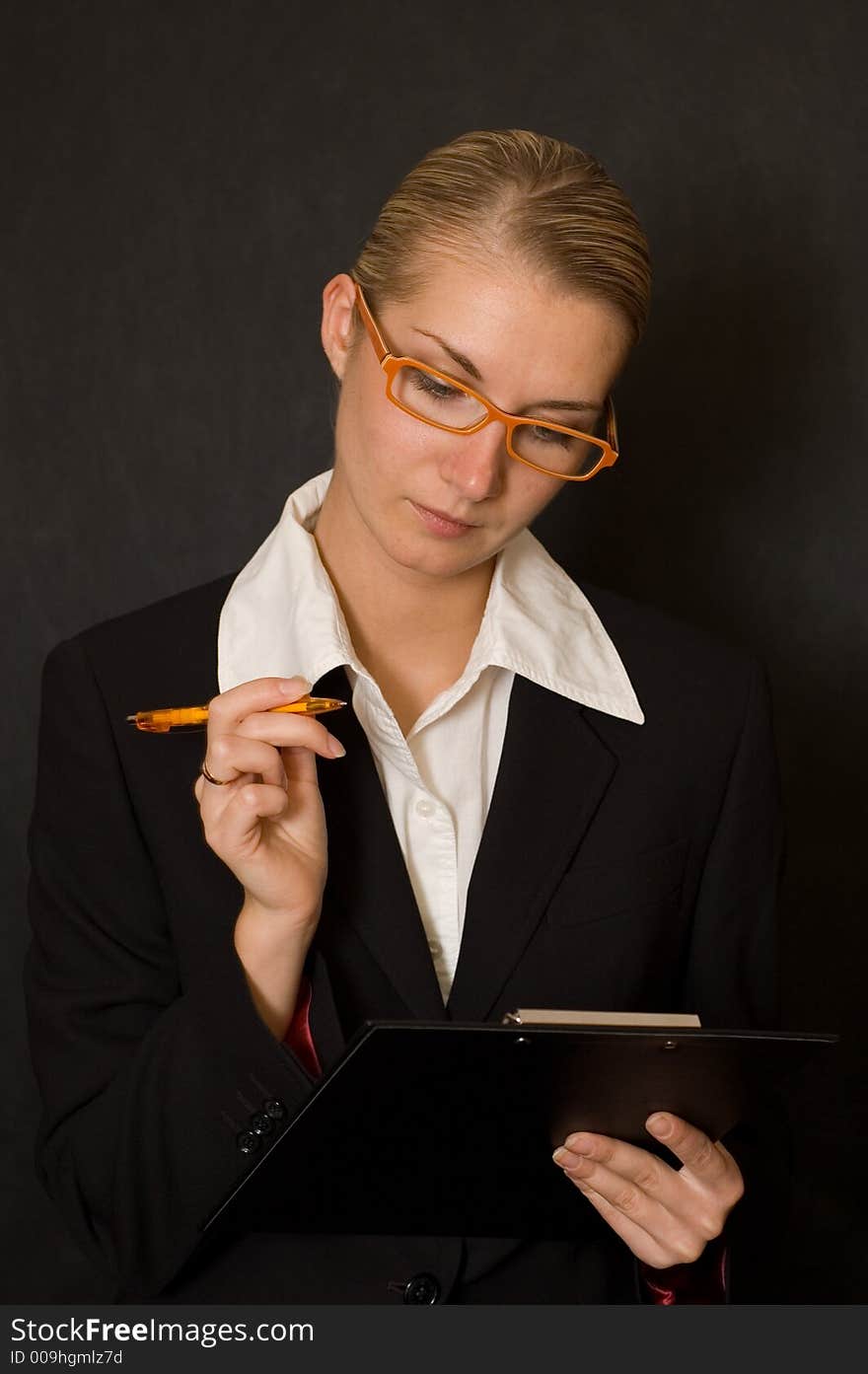 Picture of a business girl with orange glasses