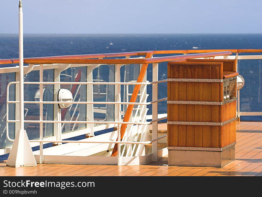 Deck of a luxury cruise liner with blue skies in background. Deck of a luxury cruise liner with blue skies in background