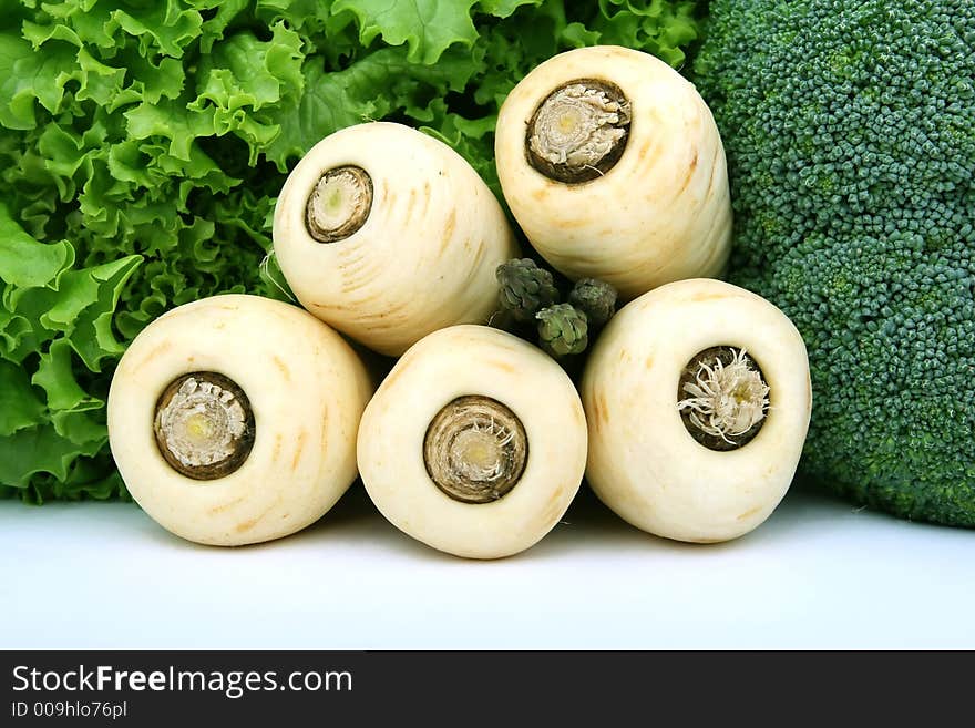 Healthy lettuce, asparagus and white parsnip vegetables