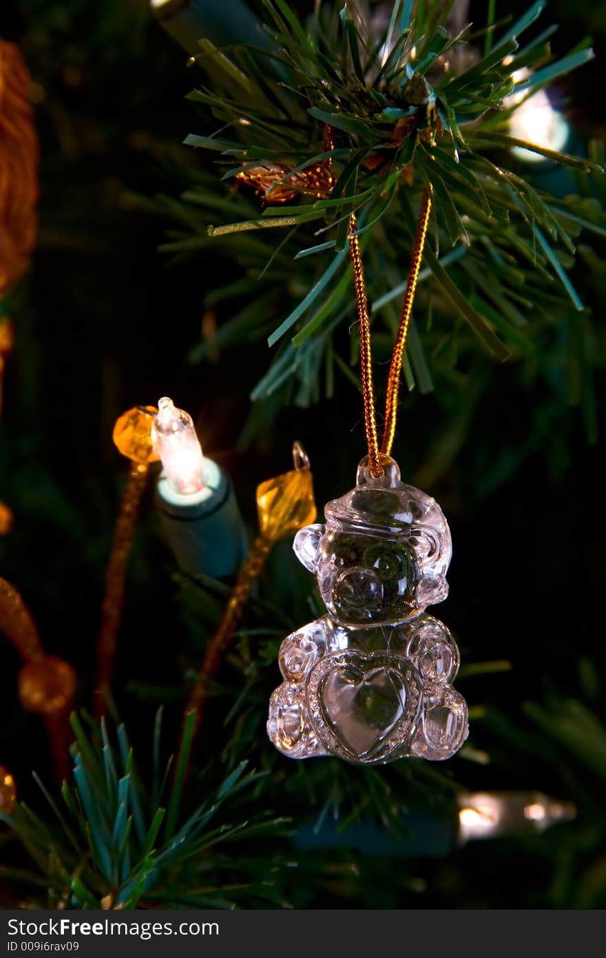 Crystal teddy bear decoration hanging on a christmas tree