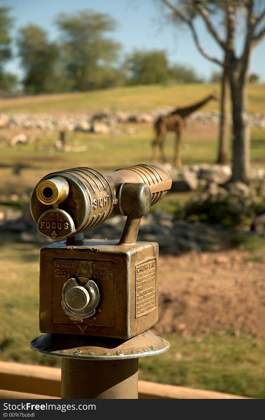 Vintage viewing scope at zoo for getting a closer view of the animals.